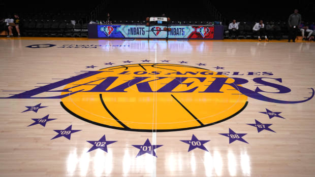 Mar 23, 2022; Los Angeles, California, USA; The Los Angeles Lakers logo at center court before the game between Philadelphia 76ers and Los Angeles Lakers at Crypto.com Arena. Mandatory Credit: Kirby Lee-USA TODAY Sports