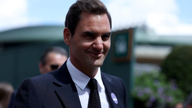 Roger Federer appears at Wimbledon's 100 year Centre Court celebration.